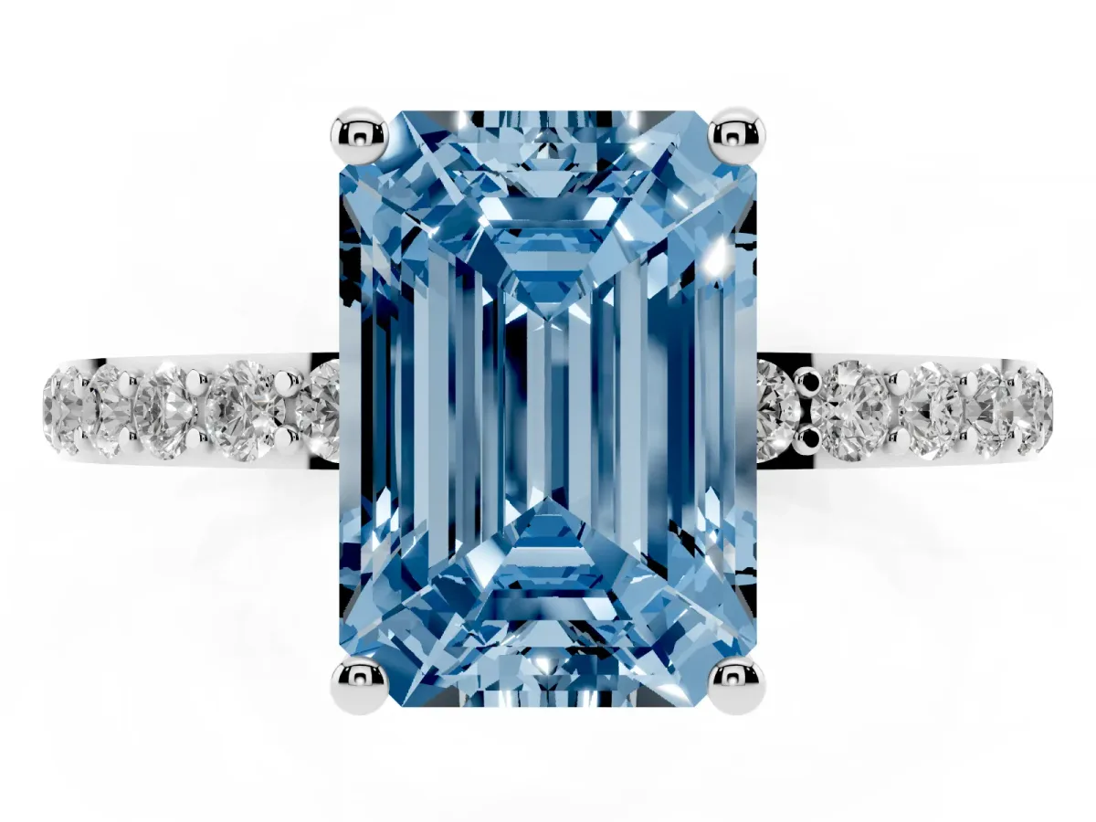 Fancy Blue Emerald Cut Diamond Solitaire Ring with Round Pavé Shoulders and Prong Setting Platinum