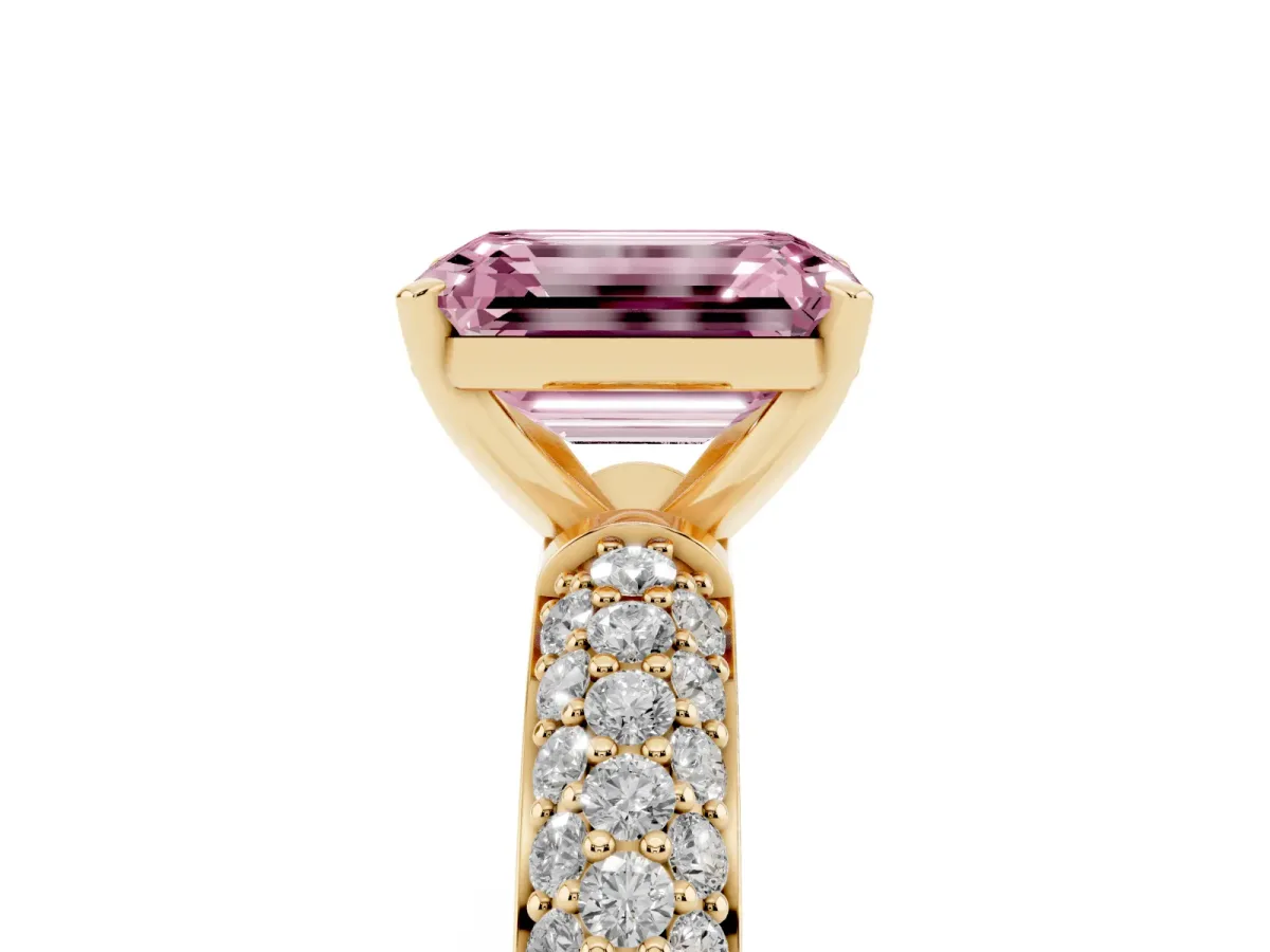 Fancy Pink Emerald Cut Diamond Solitaire Ring with Prong Setting and Pavé Band Yellow gold