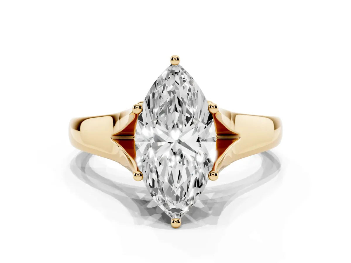 Marquise Cut Solitaire Diamond Ring with Cathedral Band and Four-Prong Setting Yellow gold