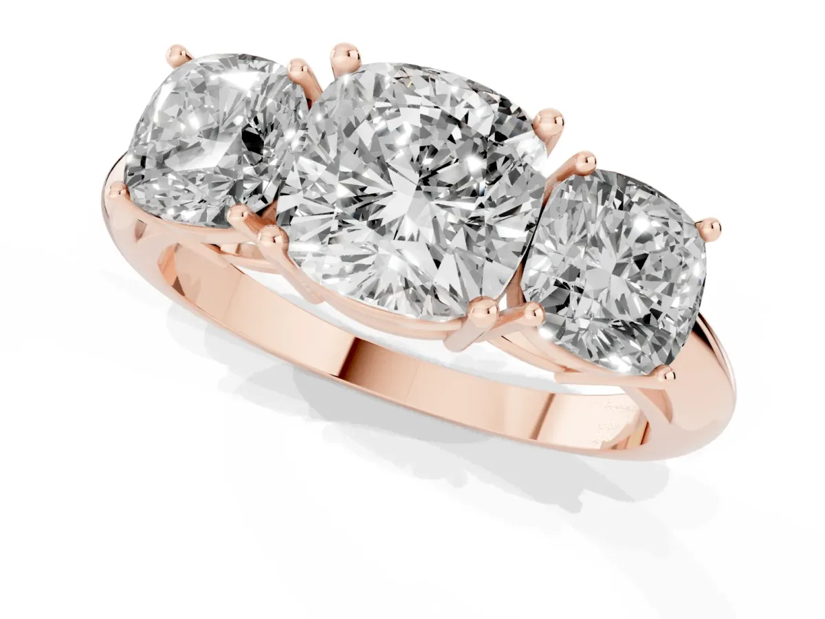 Three-Stone Cushion Cut Cut Diamond Engagement Ring with Prong Setting on a White Gold Band Rose gold