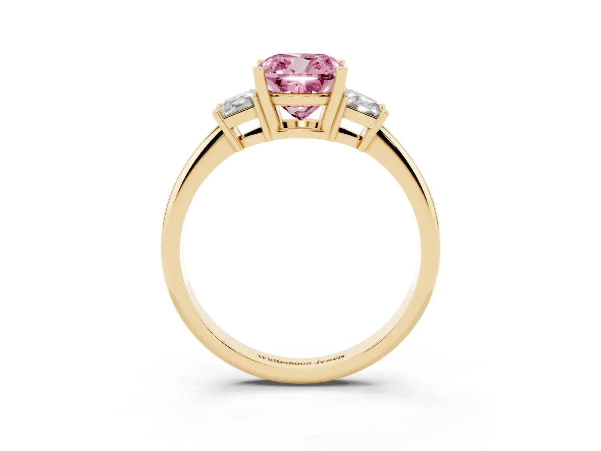 Fancy Pink Cushion Cut Diamond Three-Stone Ring with Trapezoid Side Stones and Prong Setting Yellow gold
