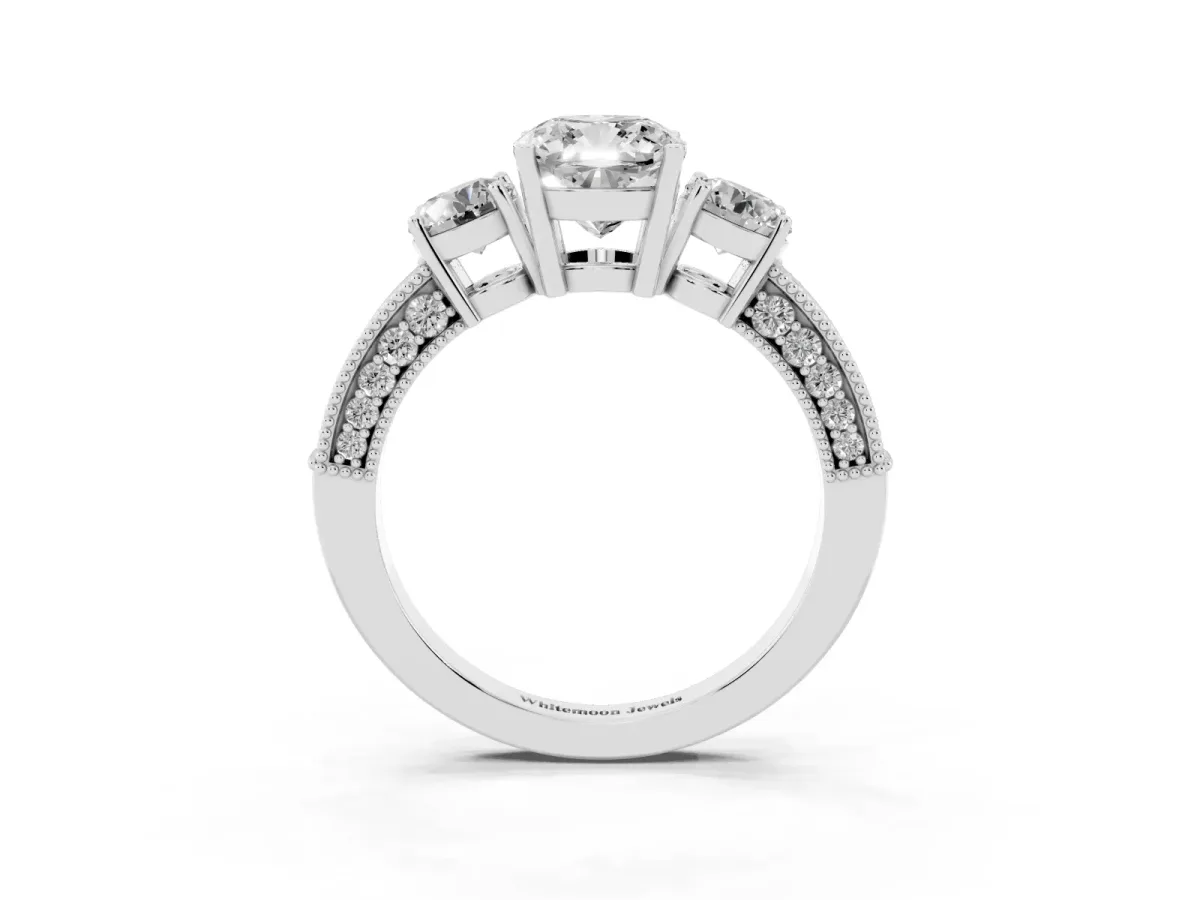 Cushion Cut Three-Stone Diamond Ring with Pavé Band and Four-Prong Setting Silver