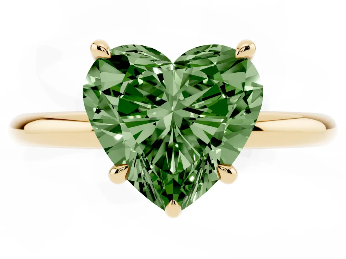 Fancy Green Heart Cut Diamond Solitaire Ring with Thin Band and Four-Prong Setting Yellow gold