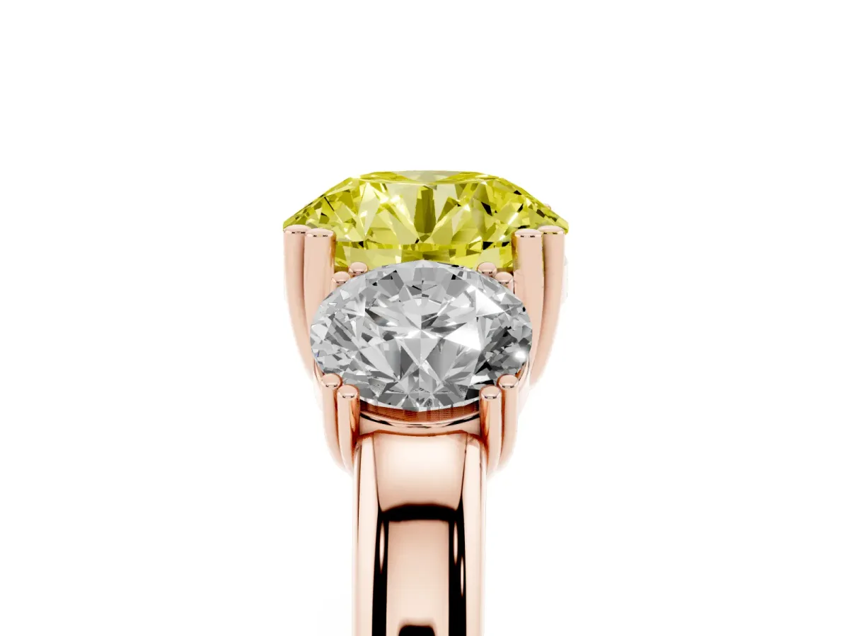 Fancy Yellow Three-Stone Round Cut Cut Diamond Ring with Channel Set Band and Four-Prong Setting Rose gold