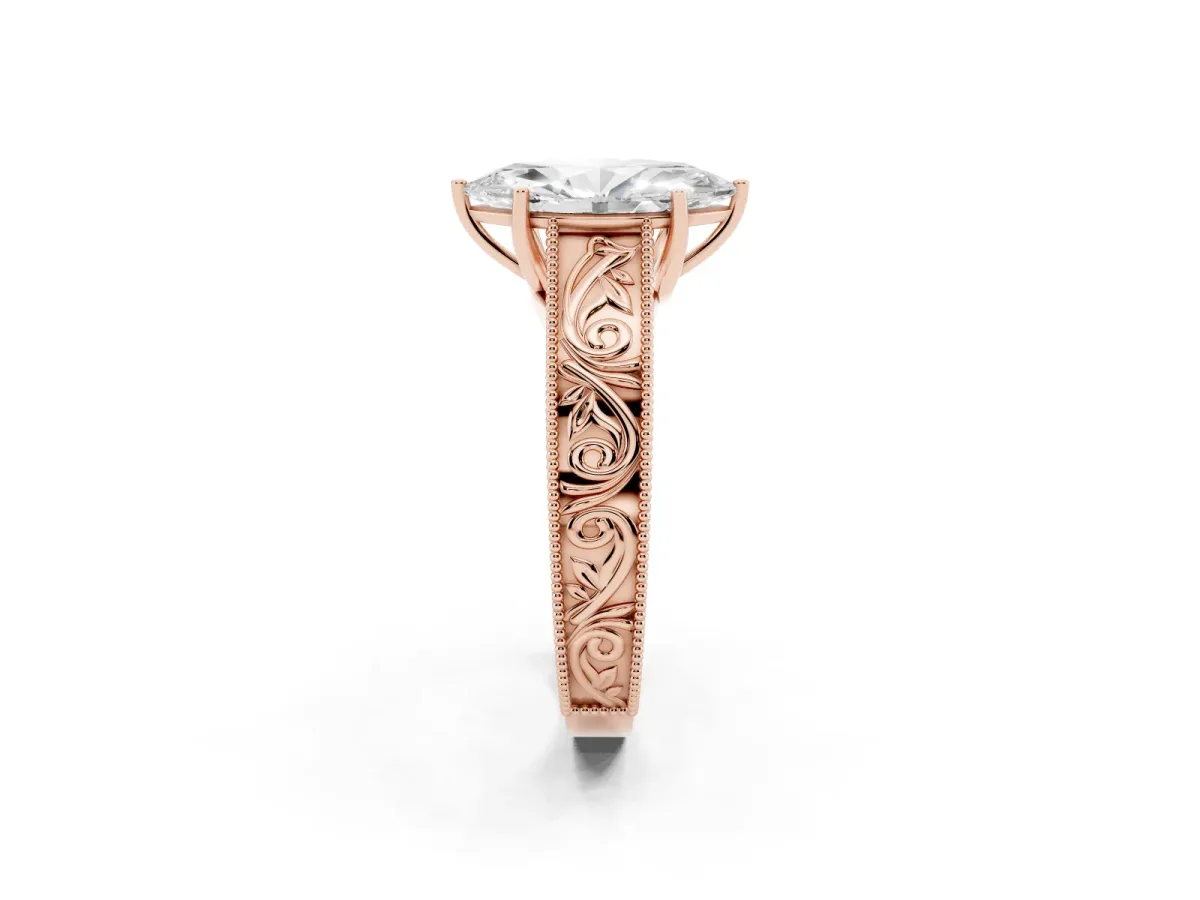 Marquise Cut Diamond Solitaire Ring with Engraved Band and Four-Prong Setting Rose gold