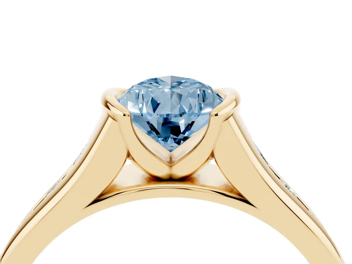 Fancy Blue Pear Cut Solitaire Bezel-Set Diamond Ring with Channel-Set Band Yellow gold
