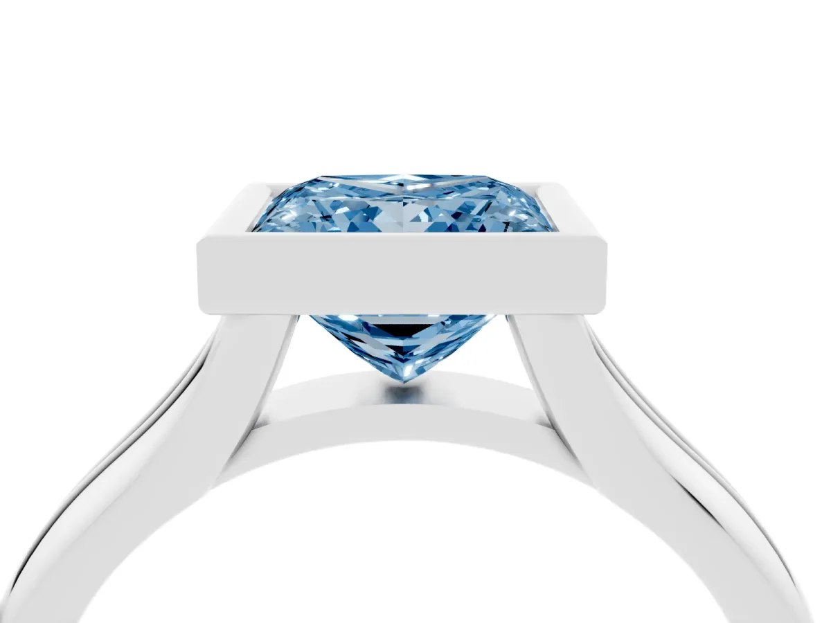 Fancy Blue Bezel Set Princess Cut Solitaire Diamond Ring with Smooth Band Silver