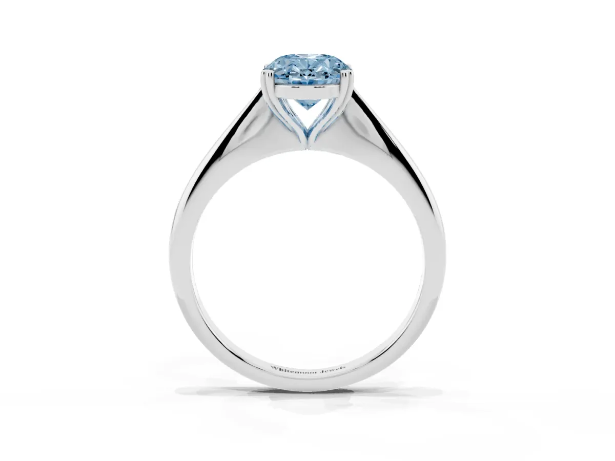 Fancy Blue Oval Cut Solitaire Diamond Ring with Six-Prong Setting and Classic Band Silver