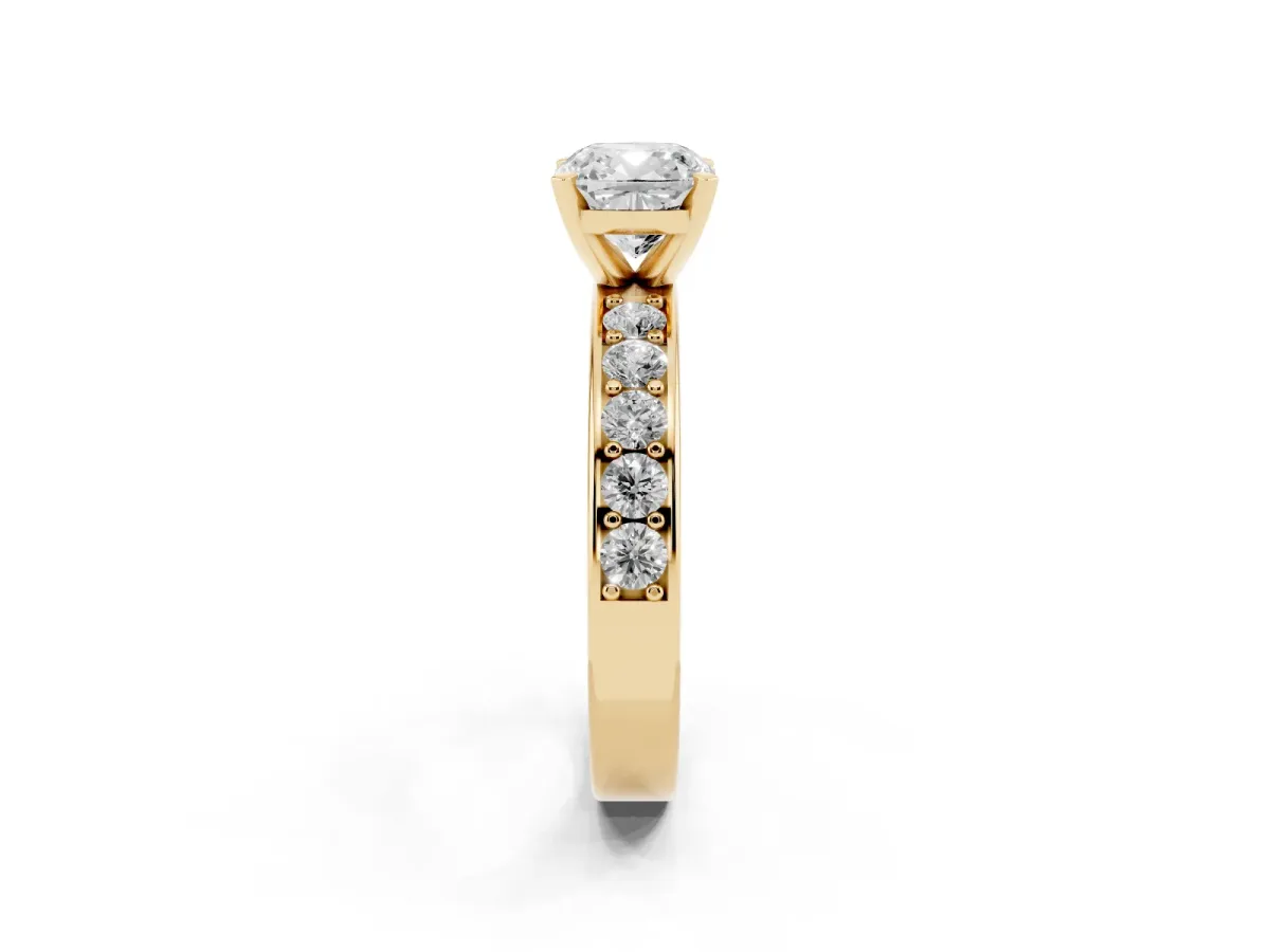 Cushion Cut Diamond Engagement Ring with Channel Set Round Band and Prong Setting Yellow gold