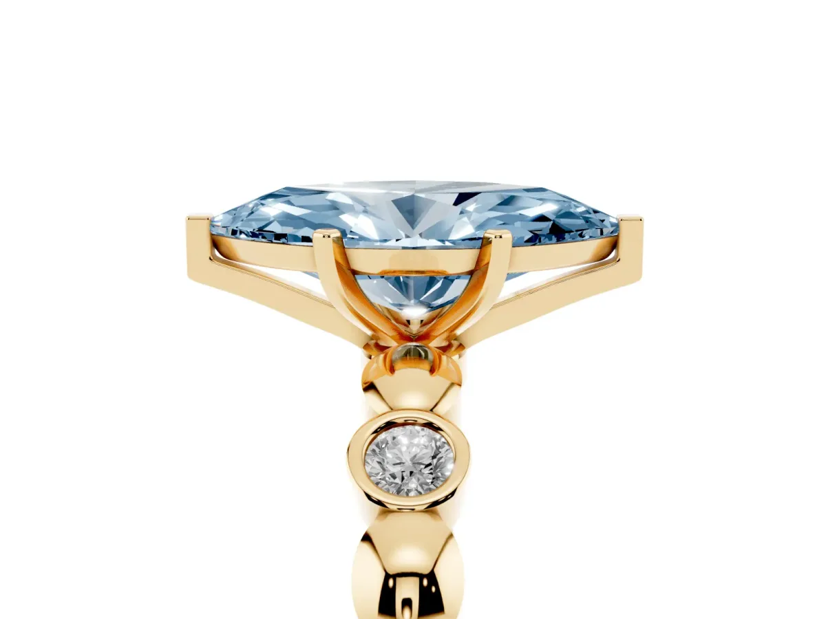 Fancy Blue Marquise Cut Solitaire Bezel-Set Diamond Ring with Beaded Band and Four-Prong Setting Yellow gold