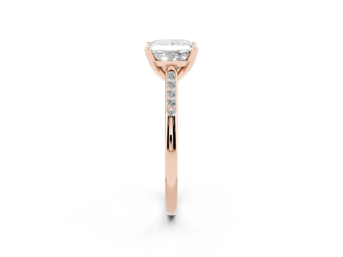 Princess Cut Diamond Solitaire Ring with Channel Set Round Band and Prong Setting Rose gold