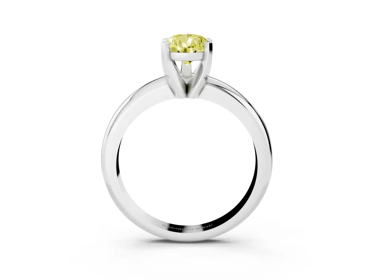 Fancy Yellow Pear Cut Diamond Solitaire Engagement Ring with Round Band and Four-Prong Setting Platinum