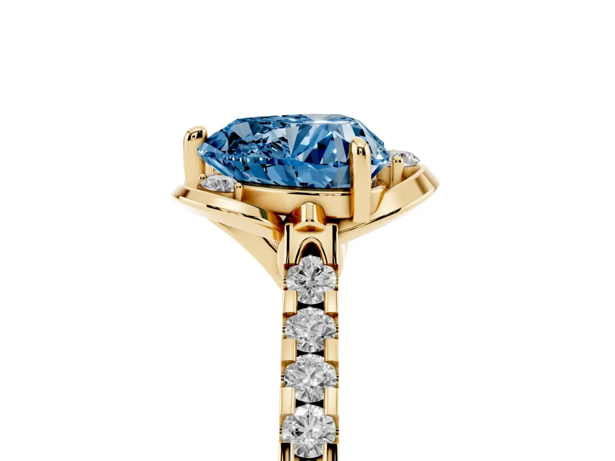 Fancy Blue Heart Cut Diamond Ring with Pavé Band and Floral Prong Setting Yellow gold