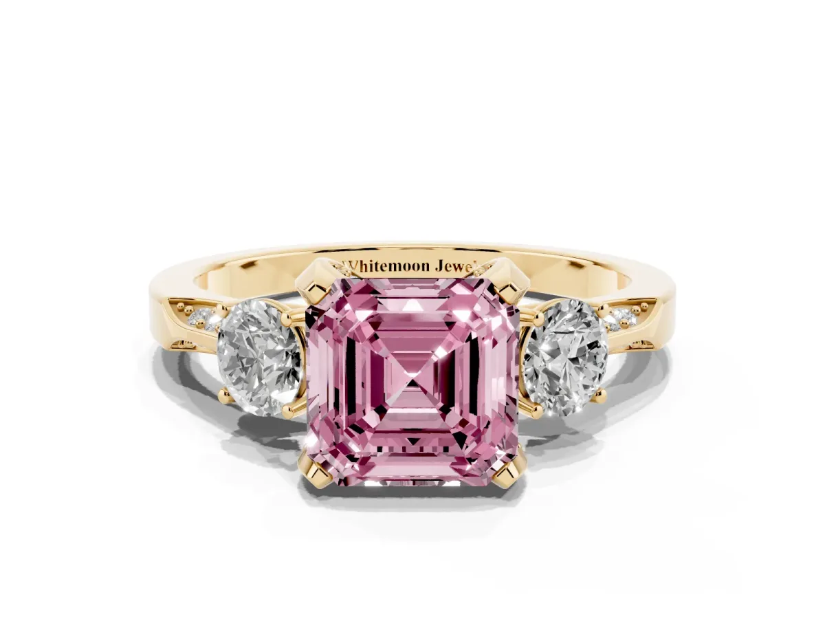 Fancy Pink Asscher Cut Brilliant Three-Stone Diamond Ring with Pavé Band and Four-Prong Setting Yellow gold