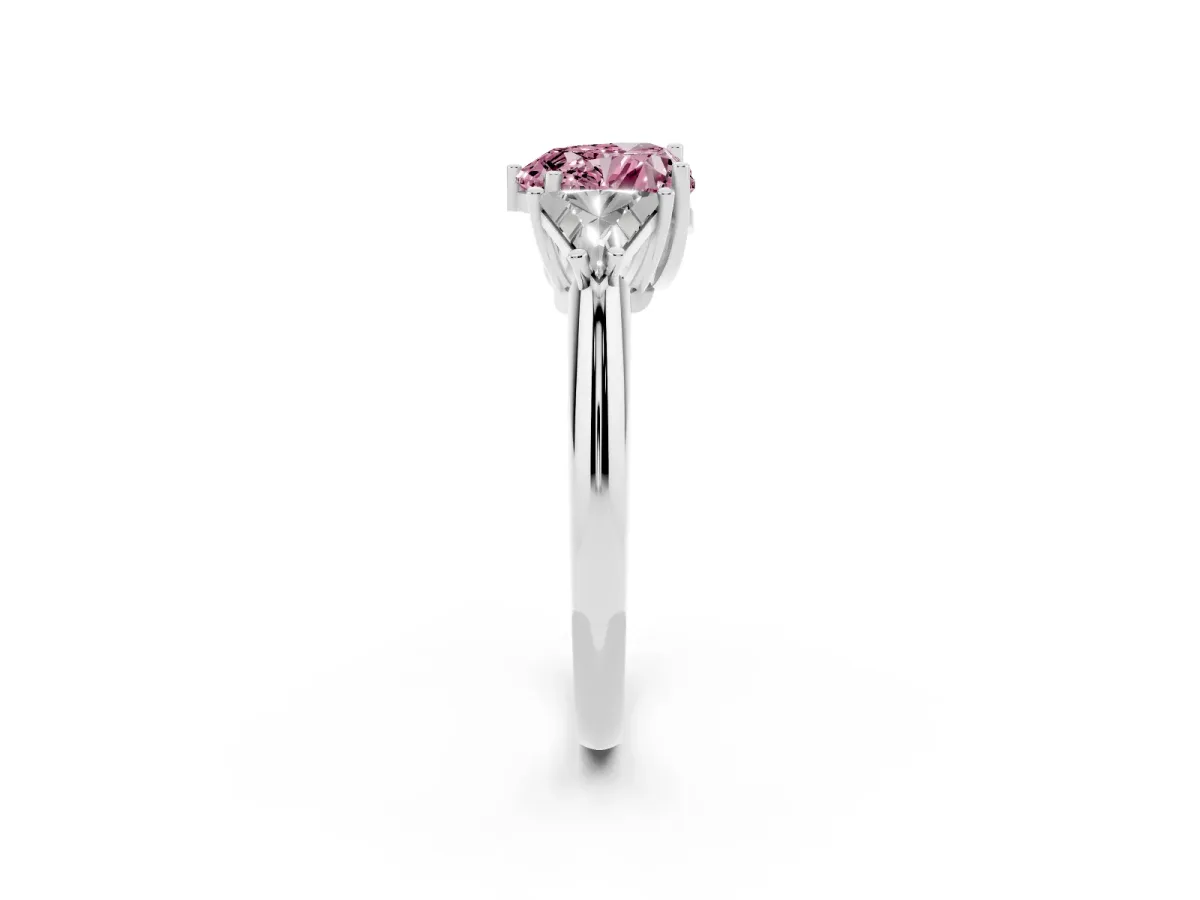Fancy Pink Three-Stone Heart Cut Diamond Engagement Ring with Trillion Side Stones and Prong Setting Silver