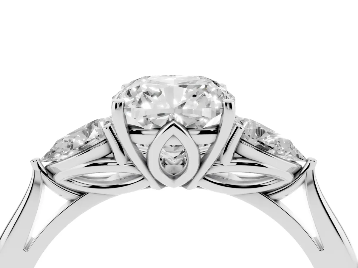 Three-Stone Cushion Cut Diamond Ring with Pear Side Stones in Four-Prong Setting Silver