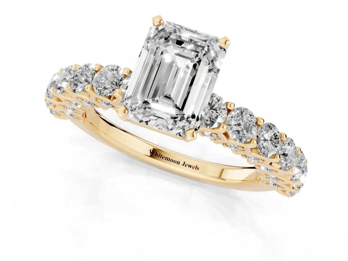 Emerald Cut Diamond Solitaire Ring with Shared Prong Pavé Band and Four-Prong Setting Yellow gold
