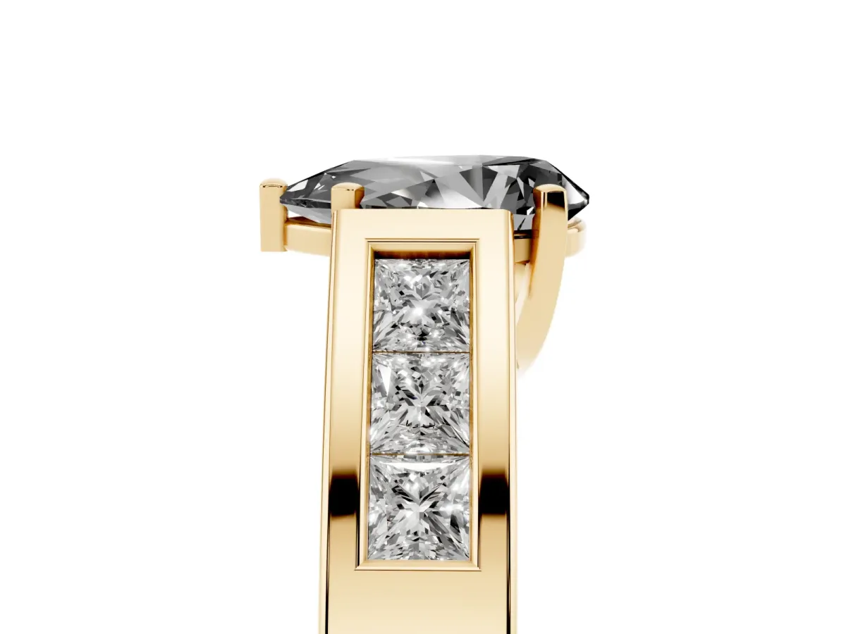 Fancy Black Pear Cut Cut Channel Set Solitaire Ring with Four-Prong Setting Yellow gold