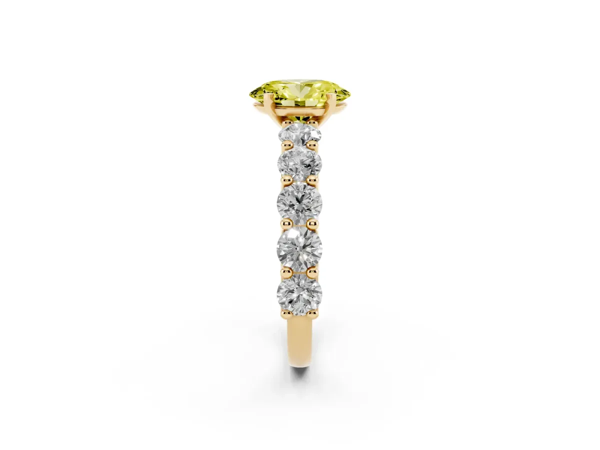 Fancy Yellow Oval Cut Diamond Prong Setting with Side Stones on a Pave Band Yellow gold