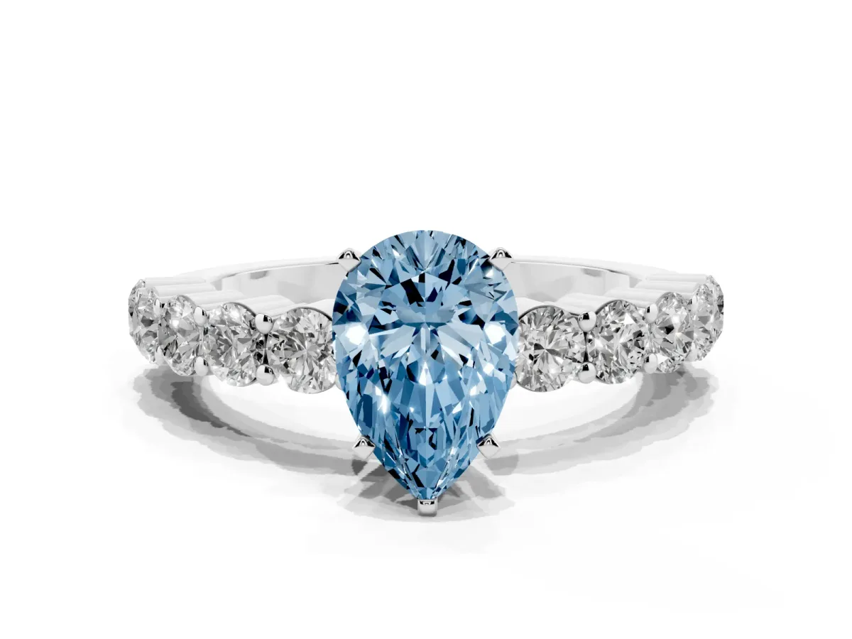Fancy Blue Pear Cut Diamond Solitaire Ring with Shared Prong Round Side Stones Platinum