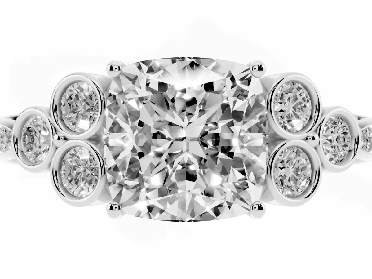 Cushion Cut Cut Diamond Engagement Ring with Bezel Set Round Side Stones and Prong Setting Platinum