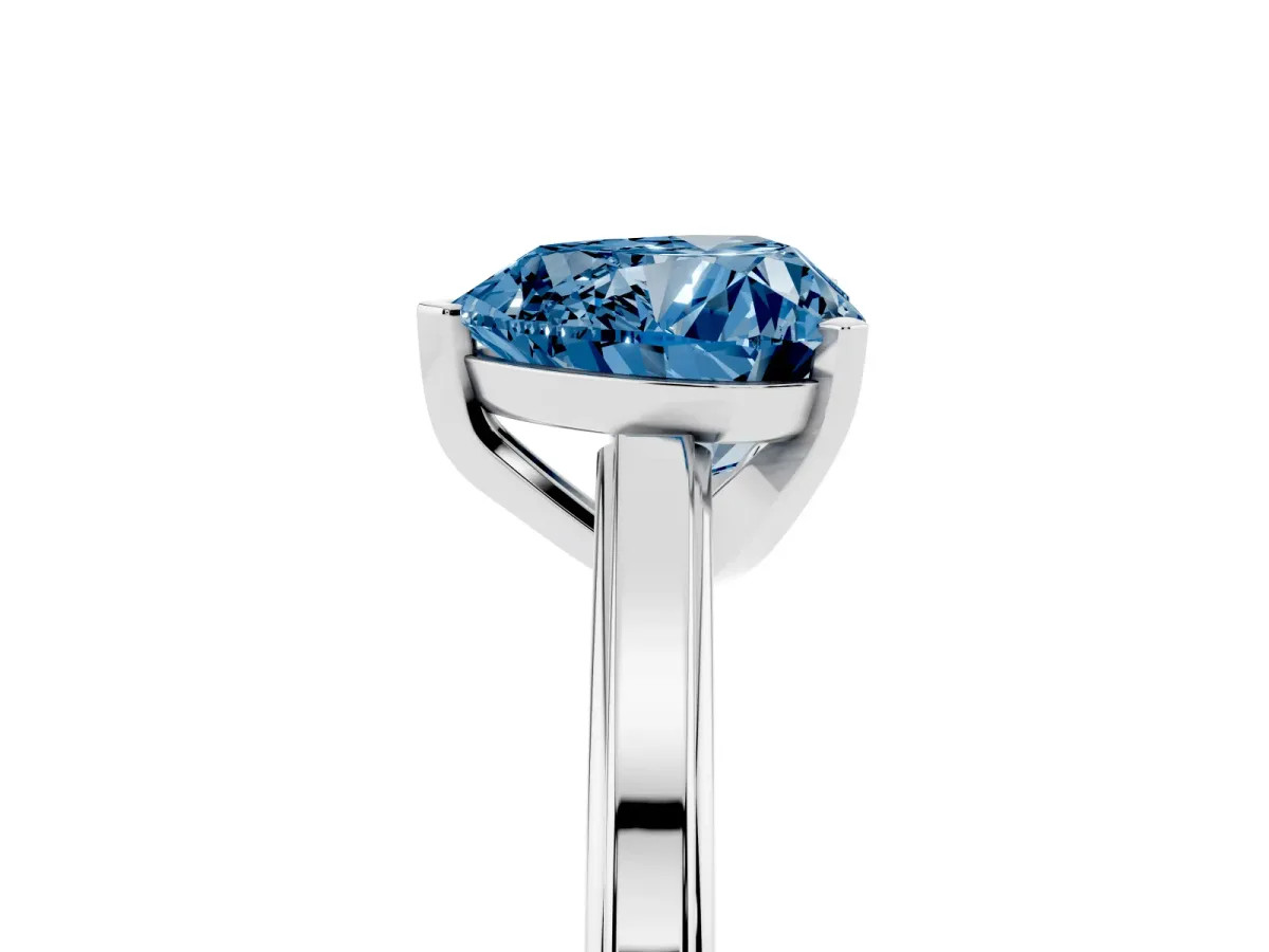 Fancy Blue Heart Cut Solitaire Diamond Ring with Four-Prong Setting and Classic Band Platinum