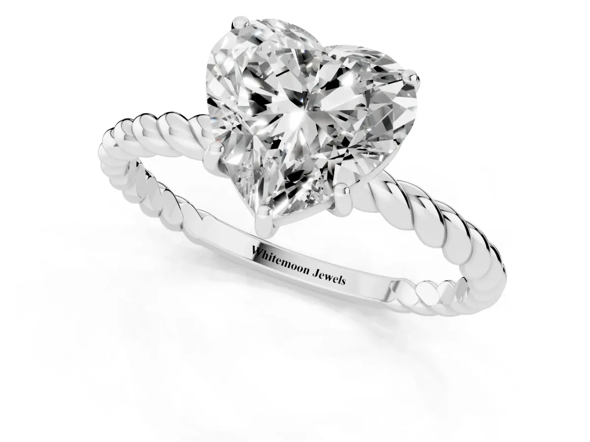 Heart Cut Solitaire Twist Band Ring with Four-Prong Setting Platinum