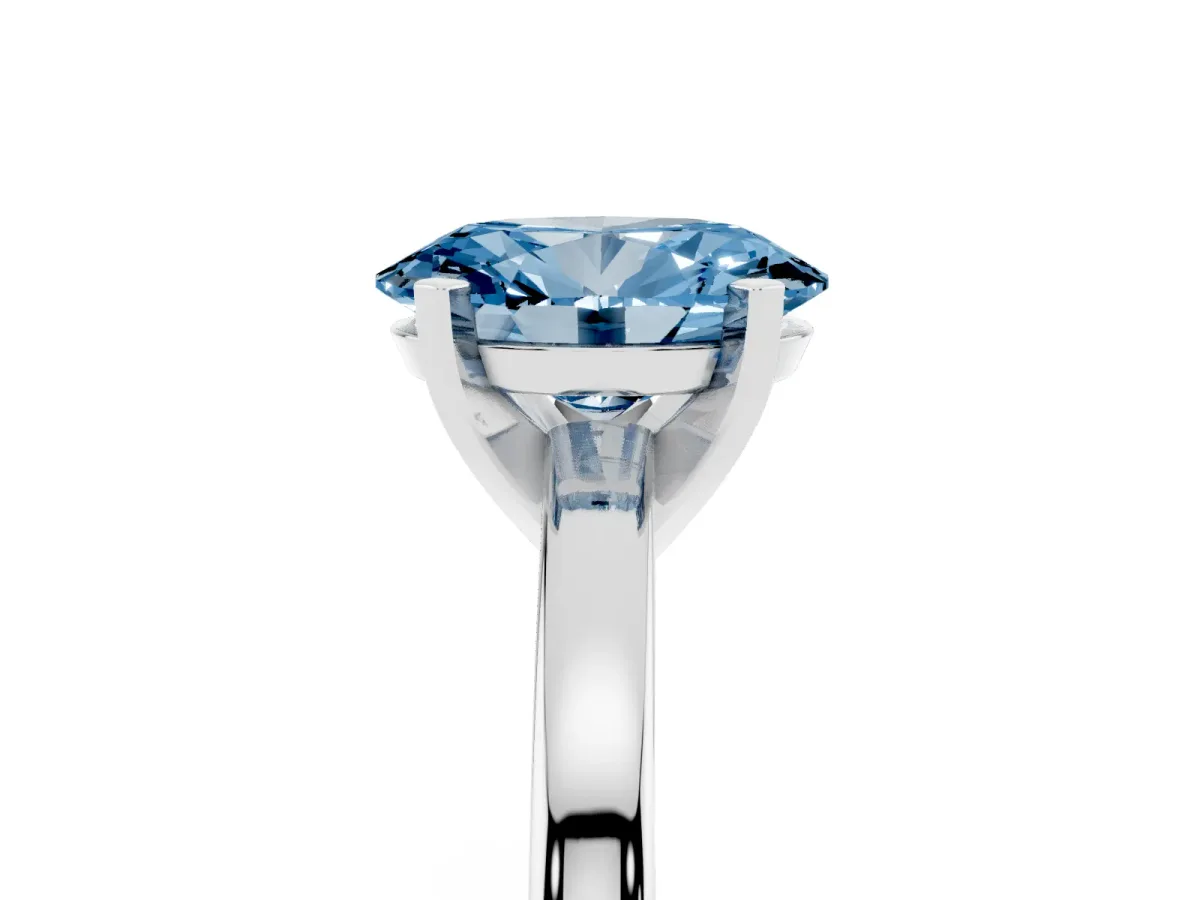 Fancy Blue Oval Cut Solitaire Diamond Engagement Ring with Four-Prong Setting on a Classic Band Silver