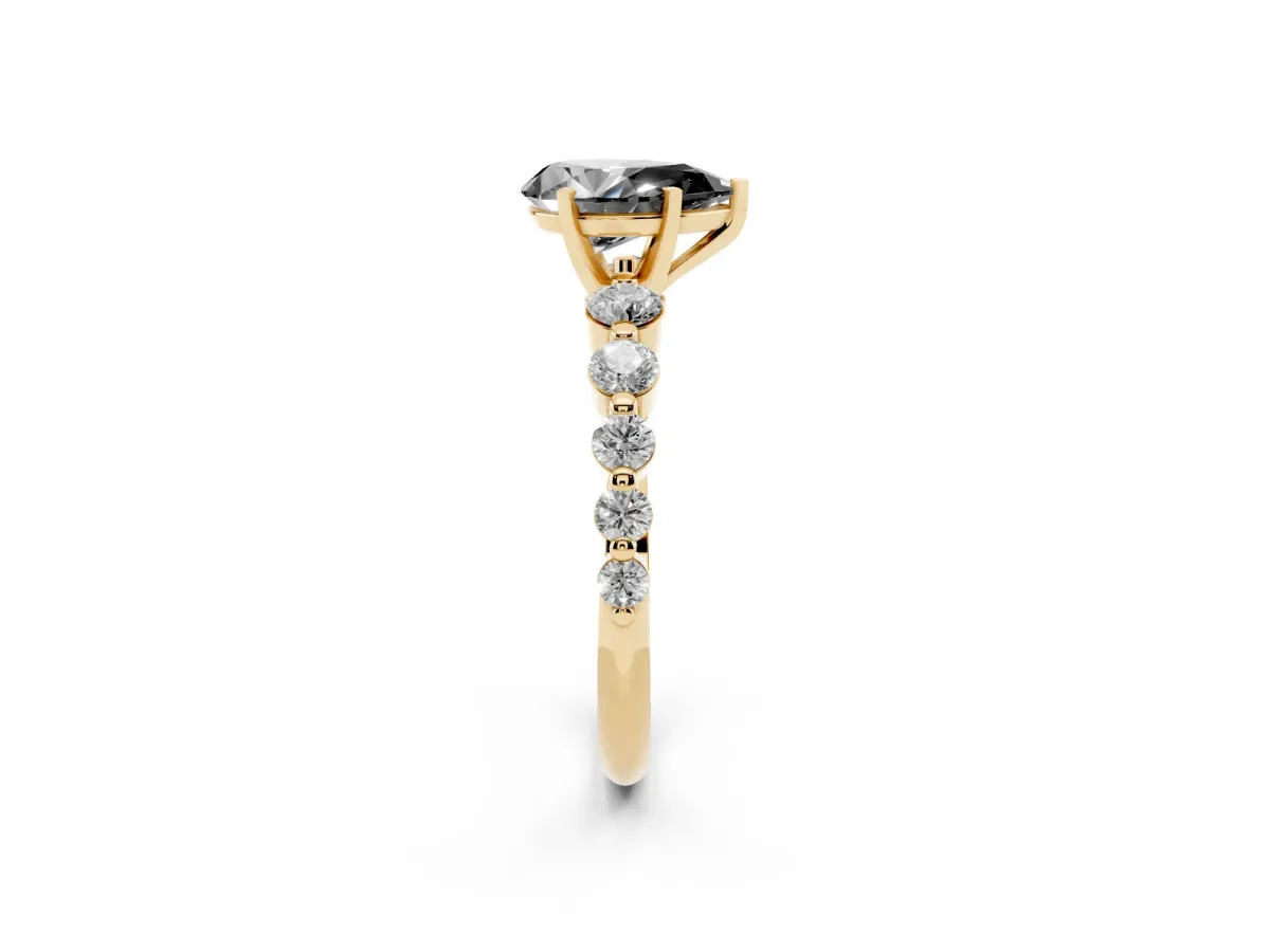 Fancy Black Pear Cut Solitaire Diamond Ring with Pave Band and Four-Prong Setting Yellow gold