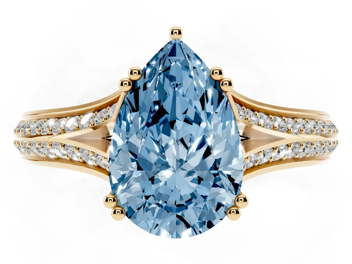 Fancy Blue Pear Cut Diamond Split Shank Engagement Ring with Pavé Band Yellow gold