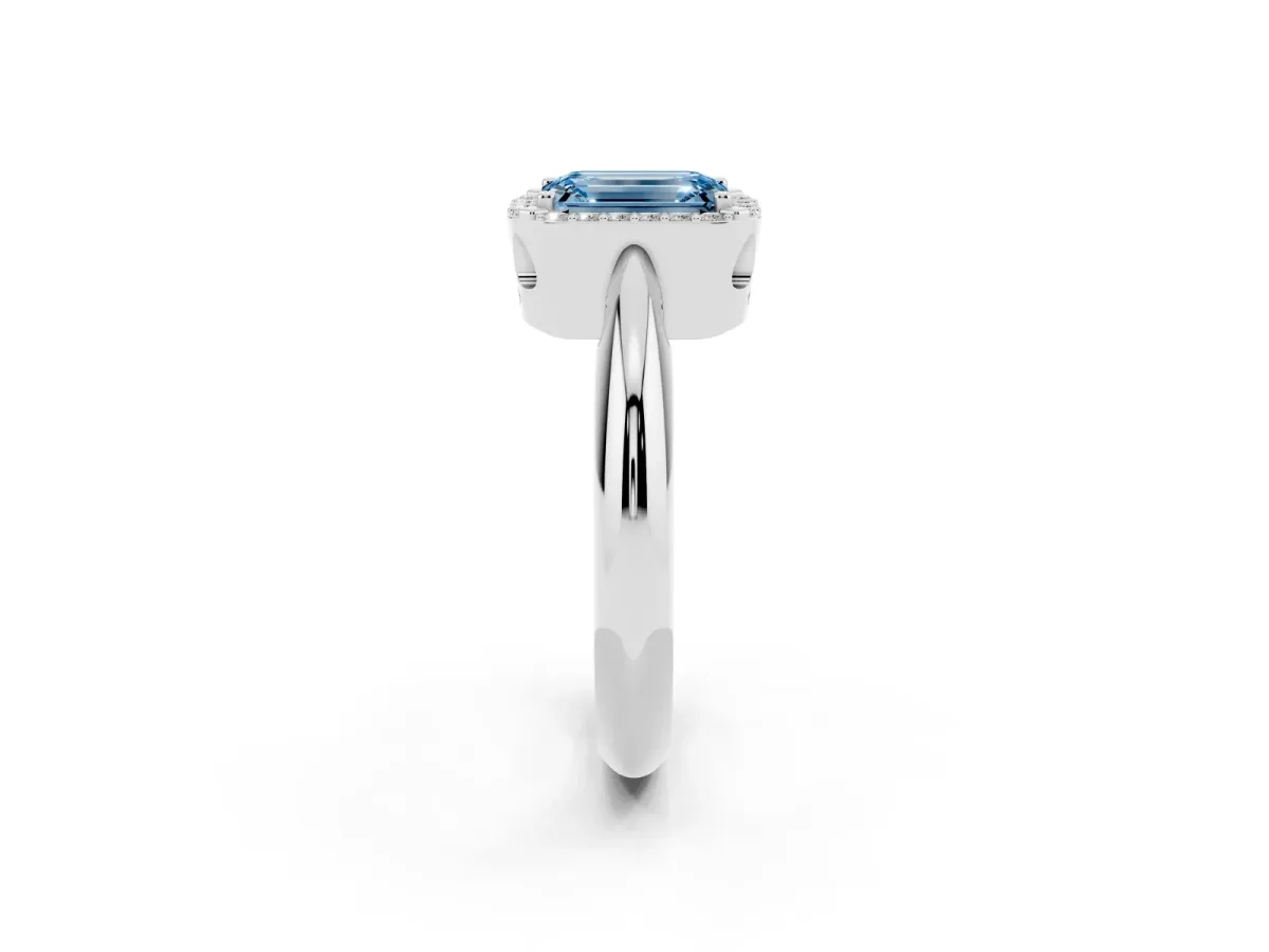 Fancy Blue Emerald Cut Cut Diamond Halo Engagement Ring with Split Shank and Four-Prong Setting Silver