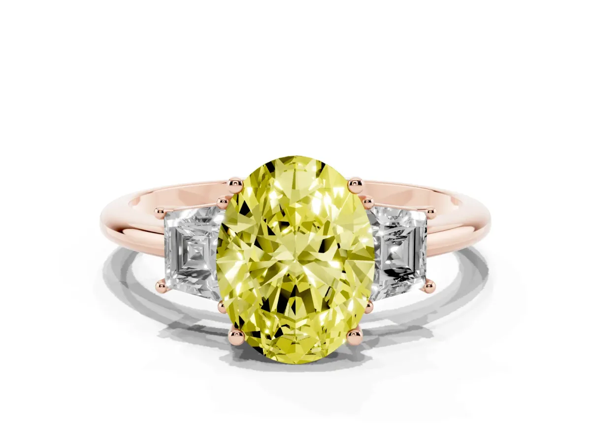 Fancy Yellow Oval Cut Diamond Three-Stone Ring with Trapezoid Side Stones and Prong Setting Rose gold