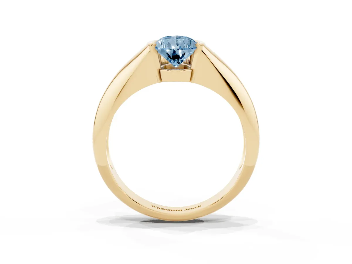 Fancy Blue Pear Cut Solitaire Tension Set Diamond Ring Yellow gold