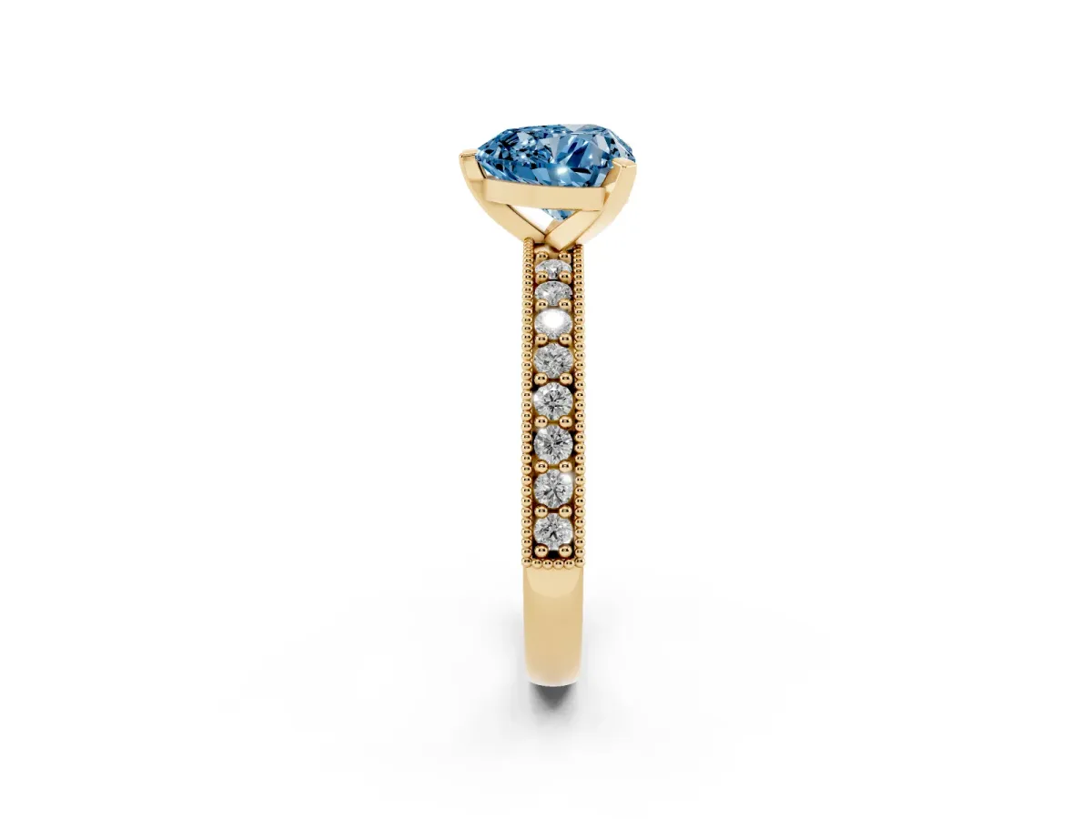 Fancy Blue Heart Cut Diamond Milgrain Pavé Engagement Ring with Four-Prong Setting Yellow gold