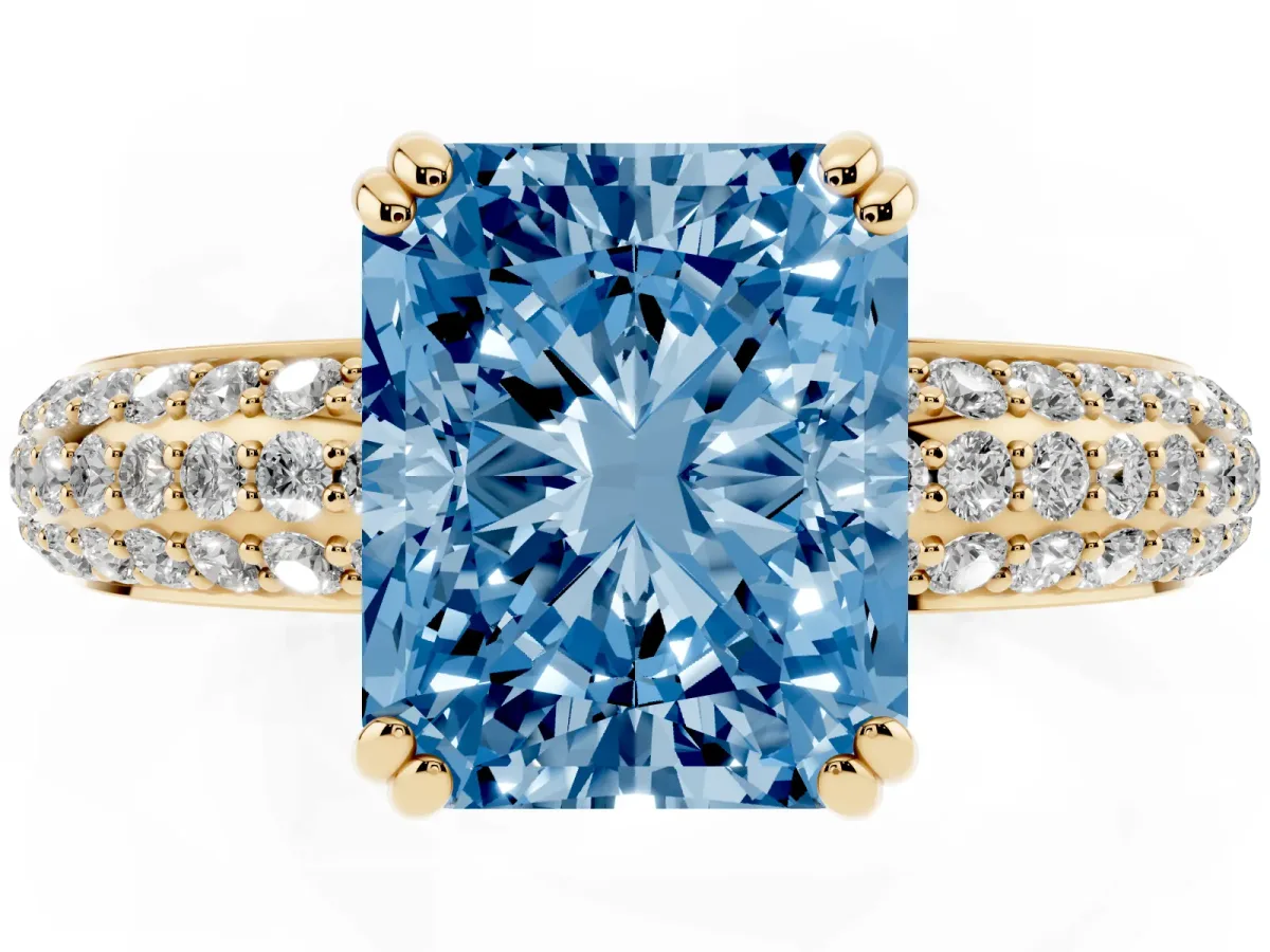 Fancy Blue Radiant Cut Diamond Solitaire Ring with Multi-Row Round Pavé Band and Prong Setting Yellow gold