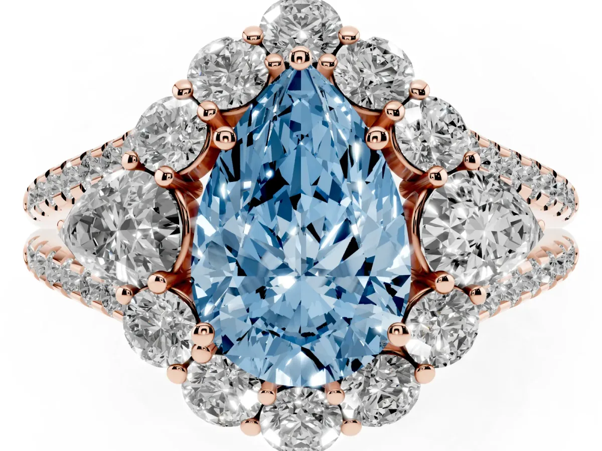 Fancy Blue Pear Cut Halo Split Shank Diamond Engagement Ring with Prong Setting Rose gold