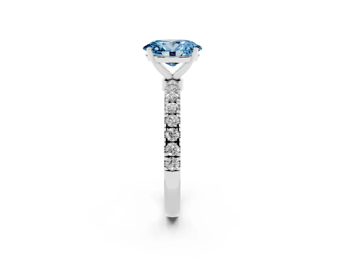 Fancy Blue Oval Cut Diamond Solitaire Ring with Pavé Accents and Four-Prong Setting Silver