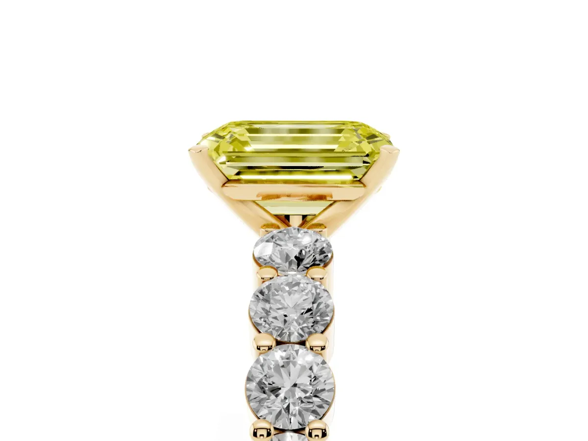 Fancy Yellow Emerald Cut Diamond Solitaire Ring with Shared Prong Round Side Stones Yellow gold