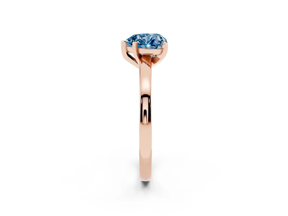 Fancy Blue Heart Cut Solitaire Diamond Engagement Ring with Four-Prong Setting on a Classic Band Rose gold