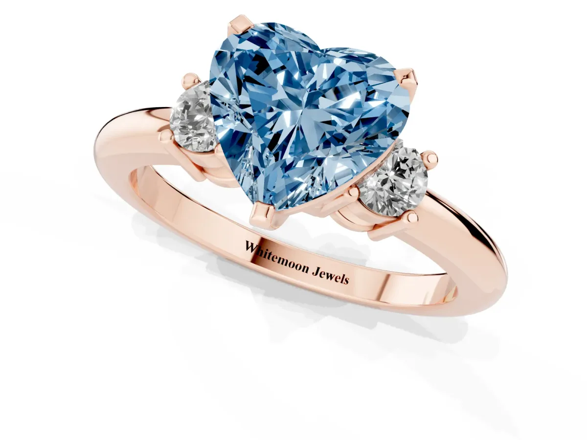Fancy Blue Three-Stone Heart Cut Cut Diamond Solitaire with Prong Setting and Classic Band Rose gold