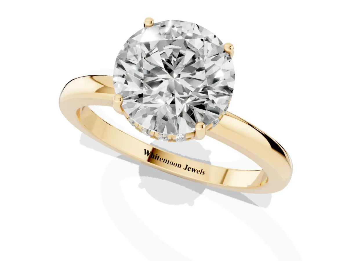 Round Cut Solitaire Diamond Ring with Prong Setting and Plain Band Yellow gold
