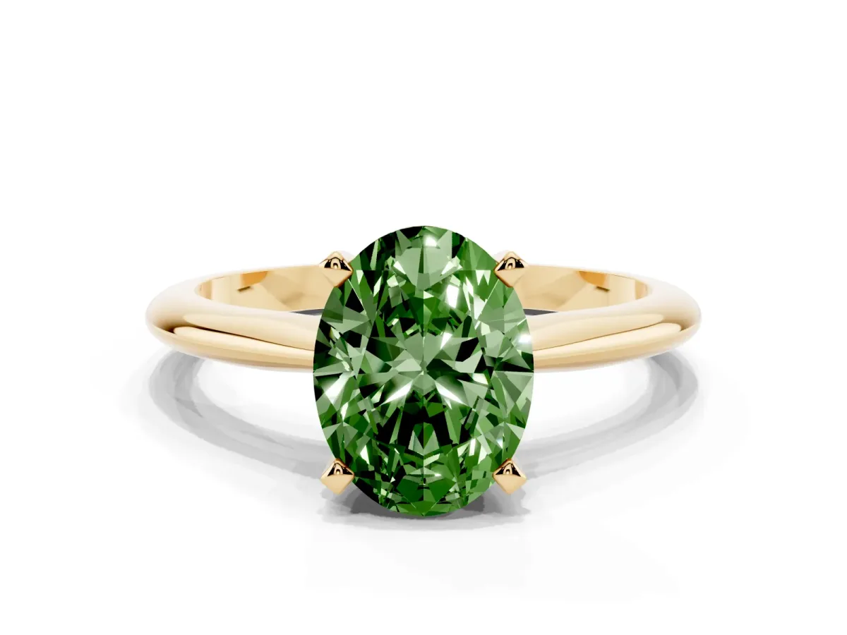 Fancy Green Oval Cut Cut Solitaire Ring with Four-Prong Setting on a Classic Band Yellow gold