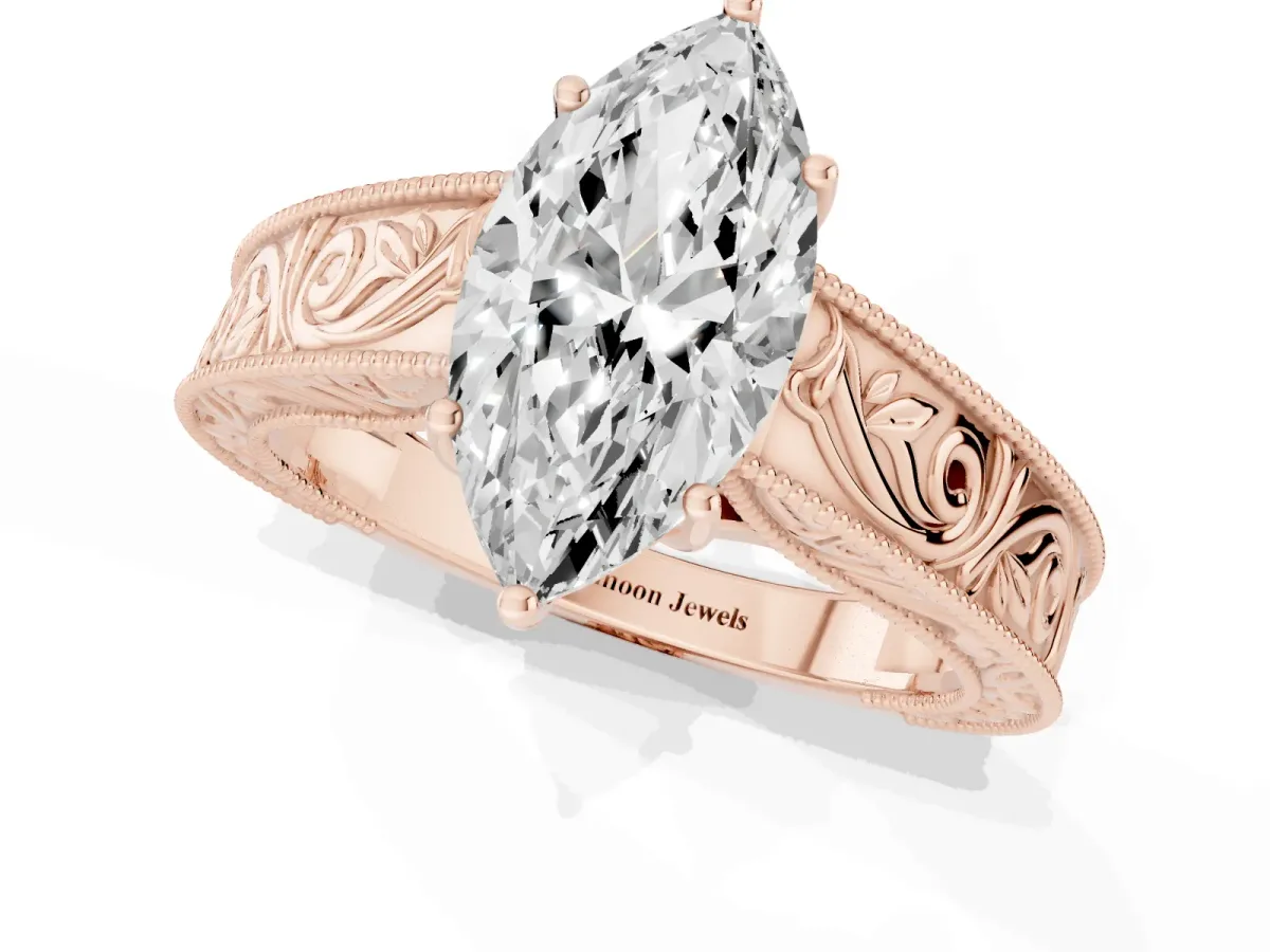 Marquise Cut Diamond Solitaire Ring with Engraved Band and Four-Prong Setting Rose gold