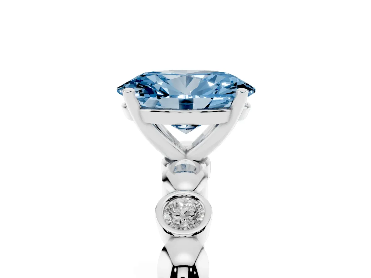 Fancy Blue Oval Cut Solitaire Bezel-Set Diamond Ring with Beaded Band and Four-Prong Setting Silver