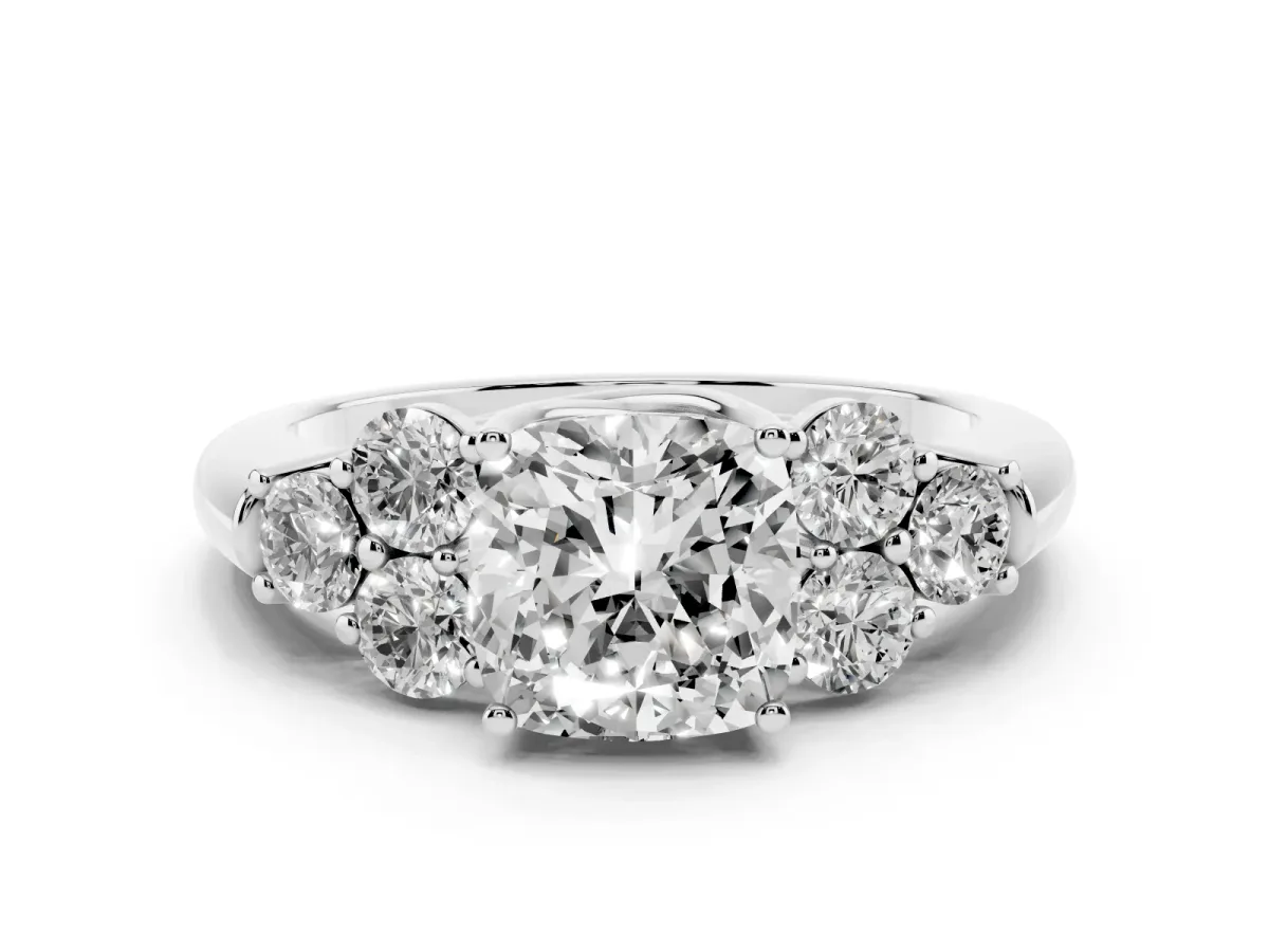 Cushion Cut Cut Diamond Cluster Ring with Round Accent Stones and Prong Setting on a Classic Band Silver