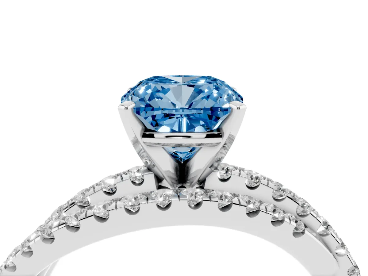 Fancy Blue Cushion Cut Solitaire Twist Band with Pavé Setting and Four-Prong Setting Silver