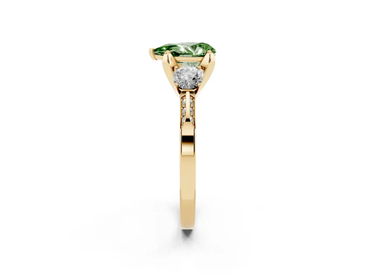 Fancy Green Pear Cut Brilliant Three-Stone Diamond Ring with Pavé Band and Four-Prong Setting Yellow gold