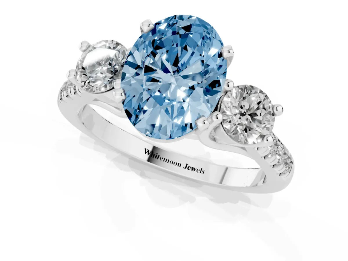 Fancy Blue Three-Stone Oval Cut Diamond Pavé Band with Four-Prong Setting White gold
