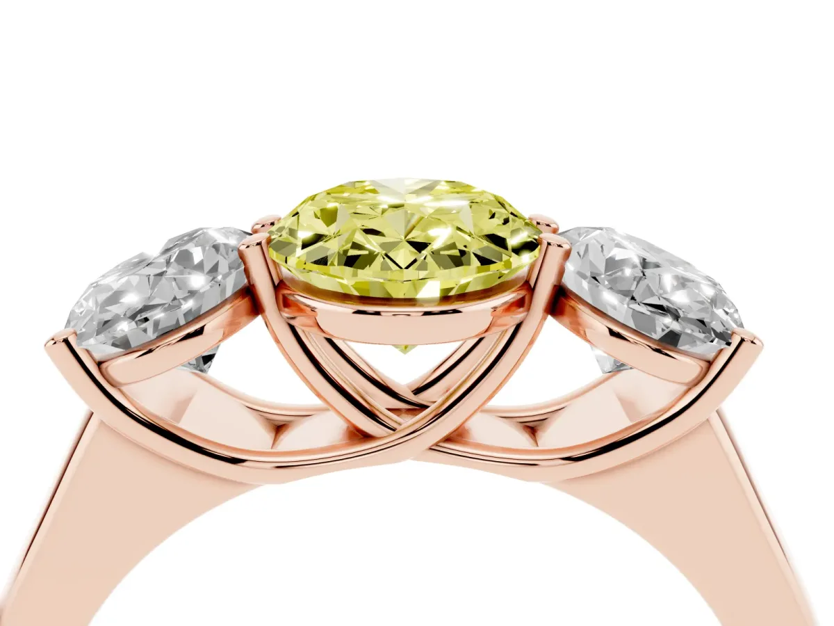 Fancy Yellow Oval Cut Three-Stone Diamond Ring with Prong Setting on a Classic Band Rose gold