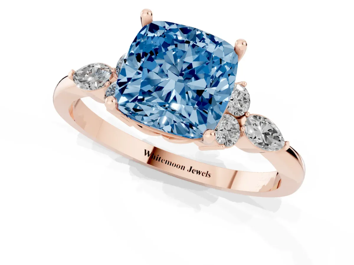 Fancy Blue Cushion Cut Brilliant Diamond Solitaire Ring with Pear Side Stones and Four-Prong Setting Rose gold